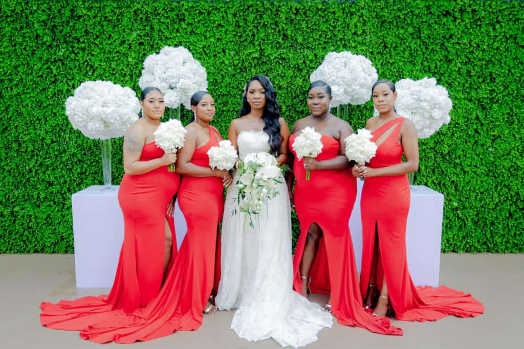 munaluchi bride and bridesmaids in red dresses