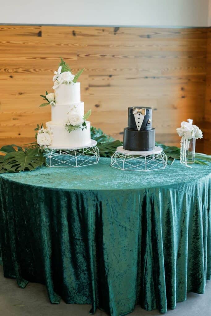 white cake green tablecloth