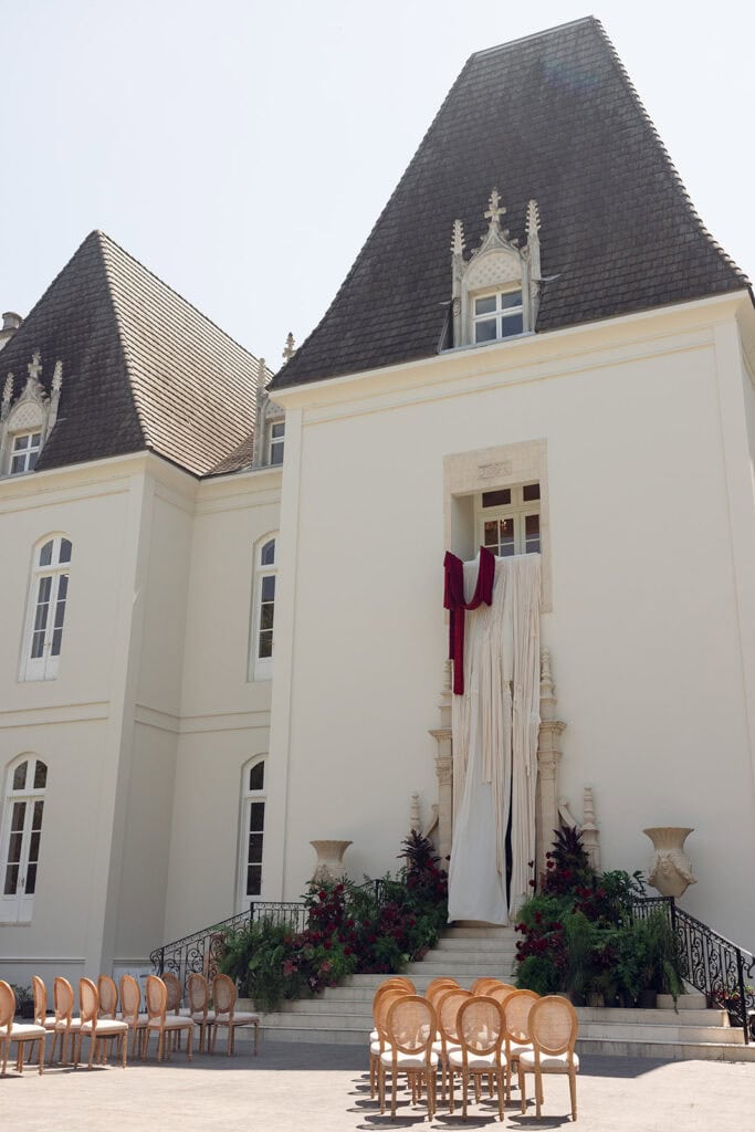 Burgundy and ivory French chateau wedding editorial at Chateau Nouvelle, designed by Épris Events – photo by Emily Snyder Photography