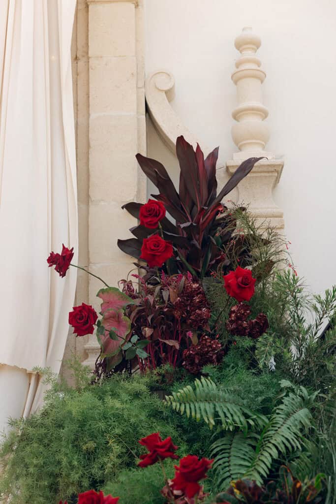 Burgundy and ivory French chateau wedding editorial at Chateau Nouvelle, designed by Épris Events – photo by Emily Snyder Photography