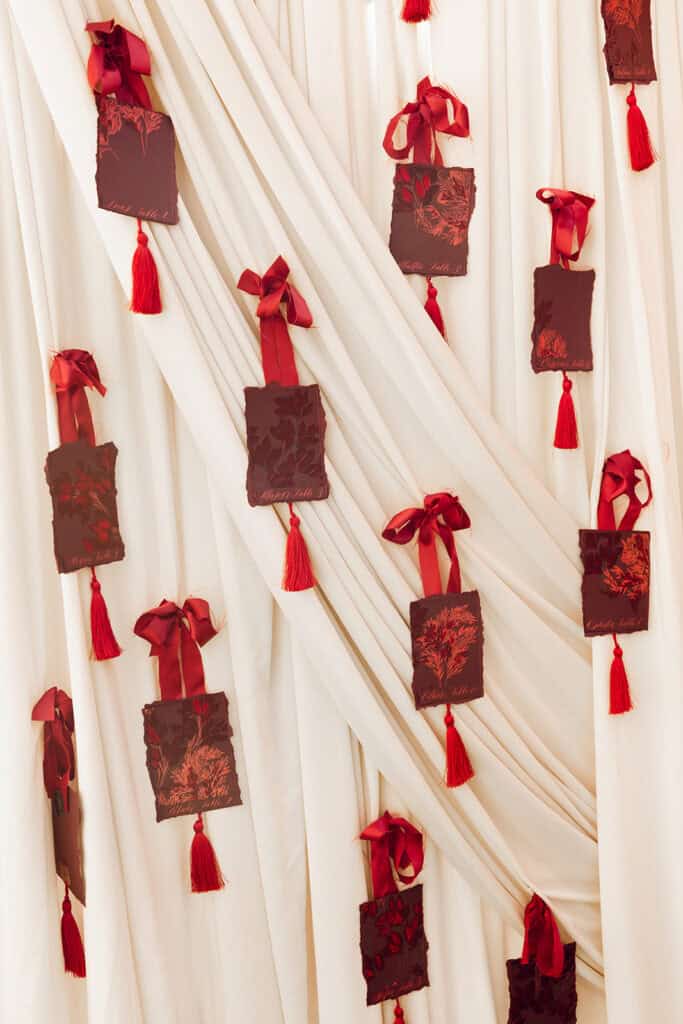 Burgundy and ivory French chateau wedding editorial at Chateau Nouvelle, designed by Épris Events – photo by Emily Snyder Photography