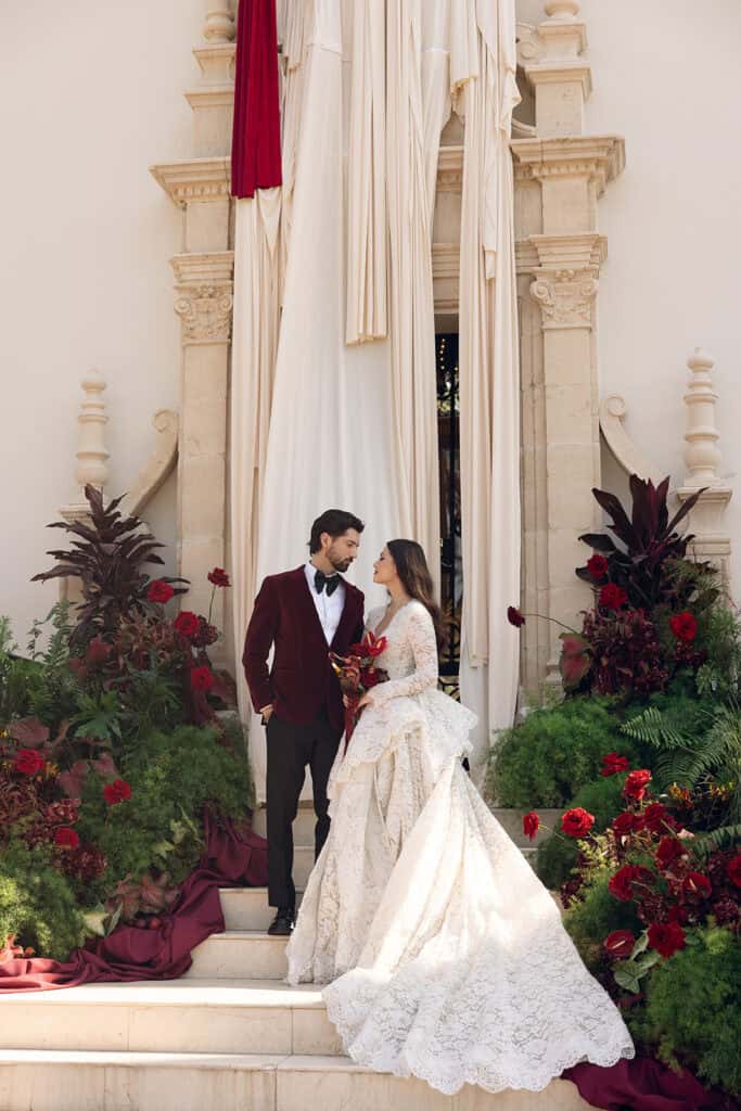 Burgundy and ivory French chateau wedding editorial at Chateau Nouvelle, designed by Épris Events – photo by Emily Snyder Photography