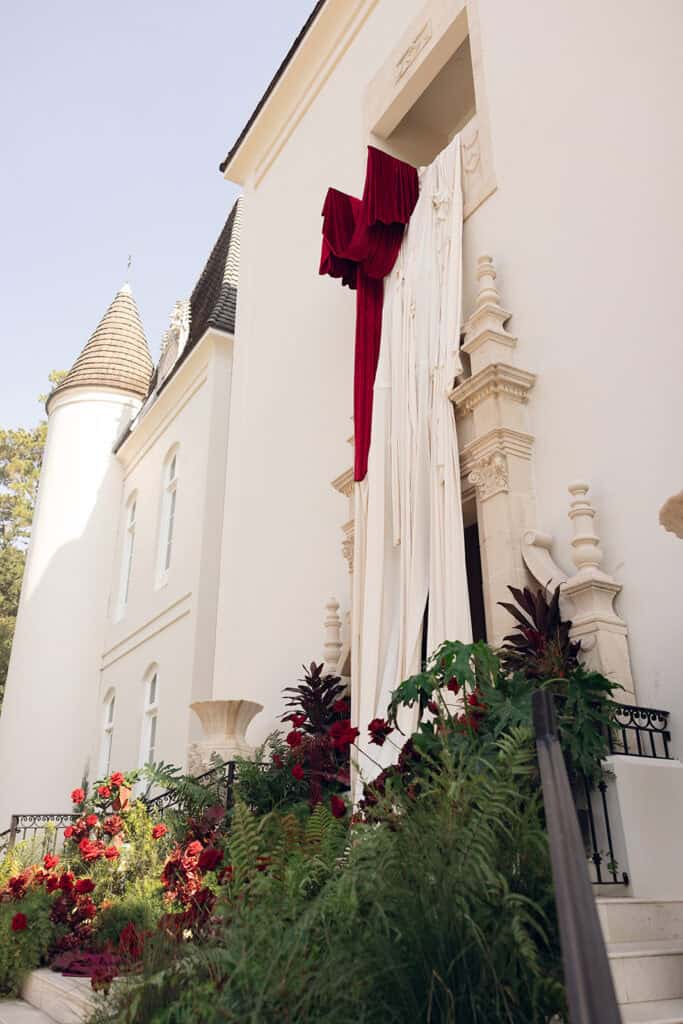 Burgundy and ivory French chateau wedding editorial at Chateau Nouvelle, designed by Épris Events – photo by Emily Snyder Photography