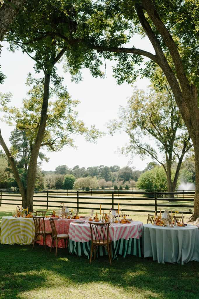 Garden wedding editorial at Sandlewood Manor with vintage cars and colorful tablescapes, designed by Épris Events – photo by Alecca Synclair Photography