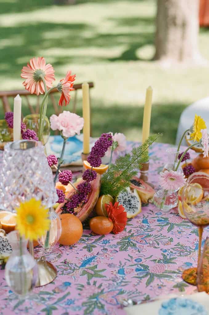 Garden wedding editorial at Sandlewood Manor with vintage cars and colorful tablescapes, designed by Épris Events – photo by Alecca Synclair Photography