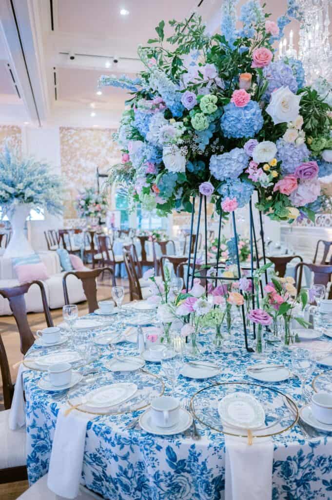 Blue and white garden tea party fundraiser at the Junior League of Houston designed by Épris Events – photo by Blanca Perez